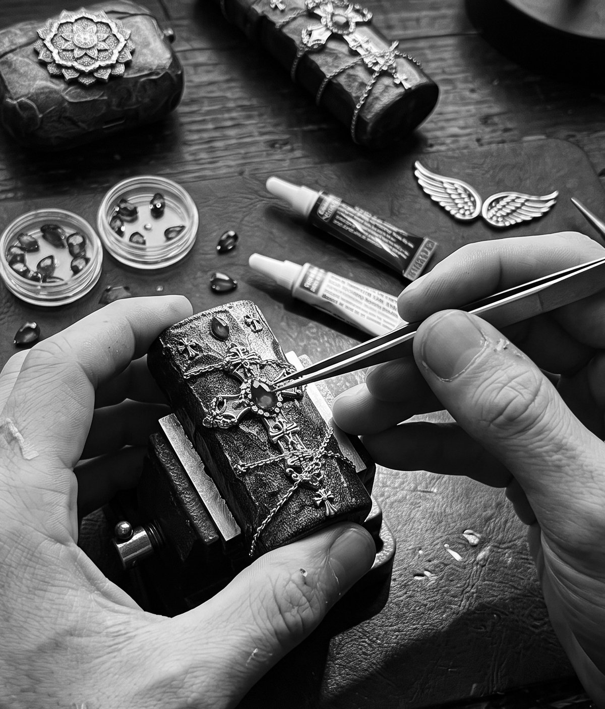 DEETROCASE — hand-setting crystal detail on a case under a bench vise